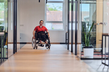 A modern young businesswoman in a wheelchair is surrounded by an inclusive workspace with glass-walled offices, embodying determination and innovation in the business world
