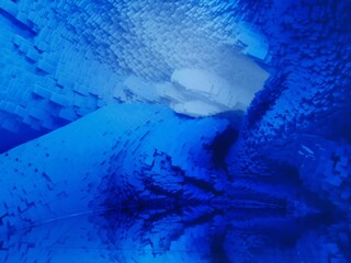 shades of turquoise and dark royal blue turbulent water and fluid blur