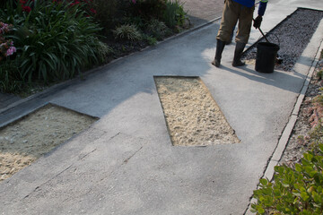 Fototapeta premium Maintenance of tarred road - repairing of potholes