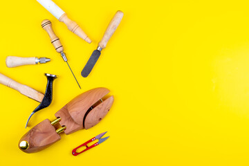 Cobber leather tools in workshop, hand craft. handbag or shoe manufacturing industry