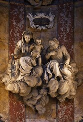 Fototapeta premium La Vergine col Bambino e San Giuseppe tra le nuvole