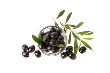 Tasty black olives isolated on white background. Olive and olive tree branches on a white table. Delicacy.
