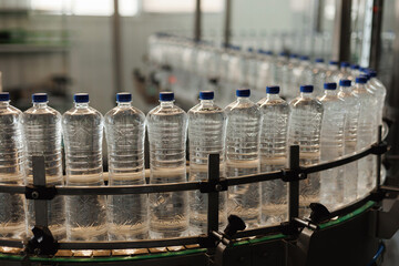 Conveyor with Plastic Bottles Filled with Fresh Water