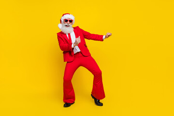 Fototapeta na wymiar Full length photo of pretty sweet santa dressed red suit tie dancing having fun discotheque empty space isolated yellow color background