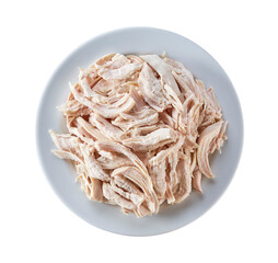 Boiled shredded chicken meat in a ceramic plate isolated on a white background. Top view.