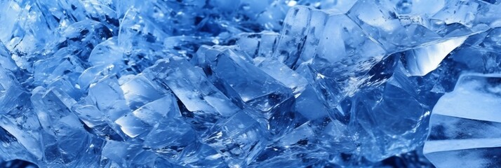 Macro shot of ice cubes. Ice texture in blue tone.  Blue background. . Blue ice crystals close up. Macro shot. Abstract background and texture for design.