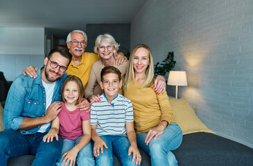 child family portrait woman mother man father grandmother daughter group smiling happy adult girl...