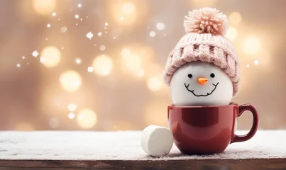 Foto op Plexiglas A warm cozy mug of hot chocolate with a snowman marshmallow. Winter drink © ink drop