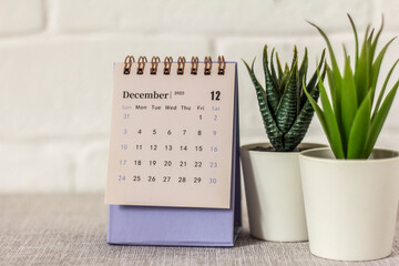 December calendar 2023 on the background of a wooden table.Planning for every day.