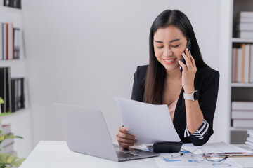 Business Documents concept : Employee woman hands working in Stacks paper files for searching and checking unfinished