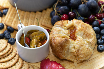 snacks on the table, danish pastry, biscuits, atcha, berries , blueberry, grapes and various crunchies