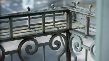 Empty Old balcony rail detail to put flower pots, rusty aged metal bar at apartment - obrazy, fototapety, plakaty