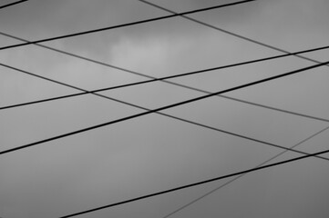 metal wires against a gray sky background