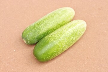 Fresh cucumbers on a wooden table