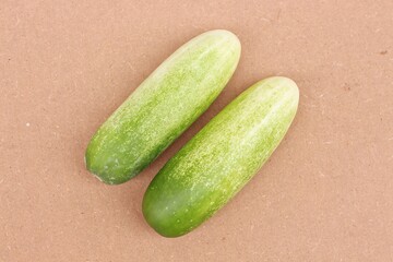 Fresh cucumbers on a wooden table