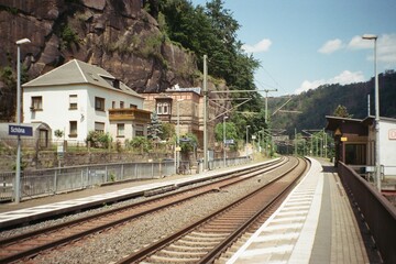 Schona, Germany - June 11, 2023: at the train station in Saxon Switzerland - analog - obrazy, fototapety, plakaty