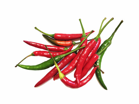 Capsicum, red chili with a white background. Apart from its uses in cooking, it has medicinal uses as well. It helps in digestion.