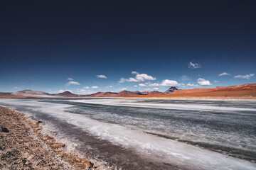 landscape with lagoons and mountains in the atacama desert in chile