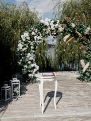 Wedding ceremony in park.