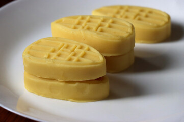 Chinese traditional dessert, mung bean cake on a white plate
