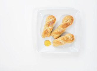 Golden Homemade Soft Pretzels with Mustard Garnish