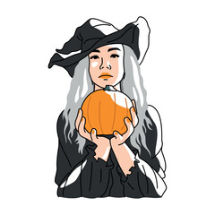 CUTE WOMAN IS WEARING BLACK WITCH COSTUME AND HOLDING A PUMPKIN