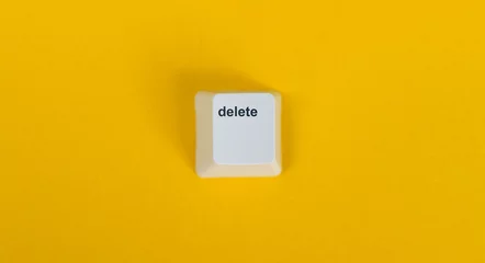 Fotobehang Keyboard Delete button on yellow background © xy