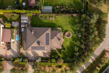 Drone photography or suburban house with solar panels
