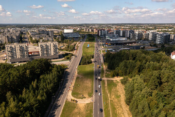 Drone photography of a highway and construction being done on it in a city