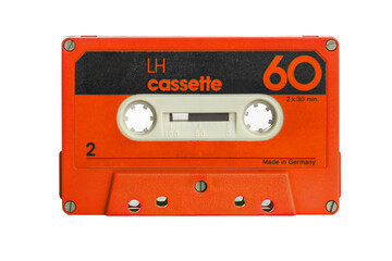 old isolated red music cassette on white