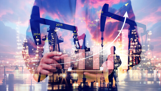 Businessman using digital tablet. Business global internet connection application technology digital marketing, Crude Oil pump oil rig energy industrial machine background. Crude oil increase price - Powered by Adobe
