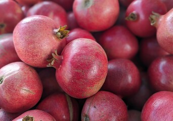 closeup of pomegranates on a market
