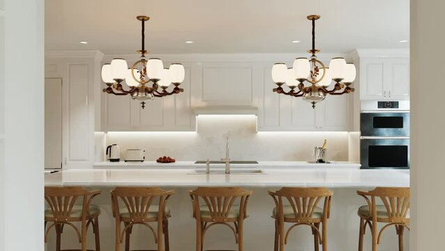 Traditional white kitchen with long island and wooden chairs with varnished wood flooring. 