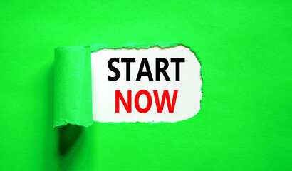 Start now symbol. Concept words Start now on beautiful white paper. Beautiful green table green background. Business marketing, motivational start now concept. Copy space.