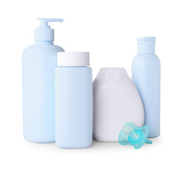 Baby cosmetic products and pacifier isolated on white