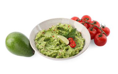 Delicious guacamole and ingredients isolated on white