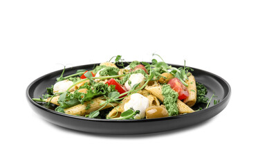 Delicious pesto pasta salad isolated on white