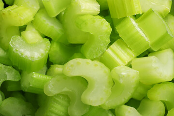 Many fresh cut celery stalks as background, closeup