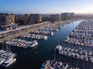 Aerial drone views of the marina in Marina Del Rey, California in the morning light. Views of...