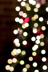 Garland bokeh on a Christmas tree. Christmas atmosphere