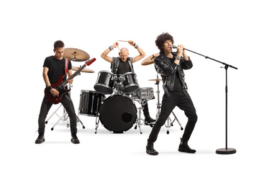 Male music band performing with a guitarist, drummer and a singer