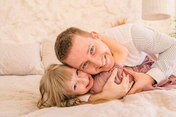 father with daughter having fun