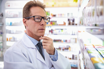 Handsome pharmacist working