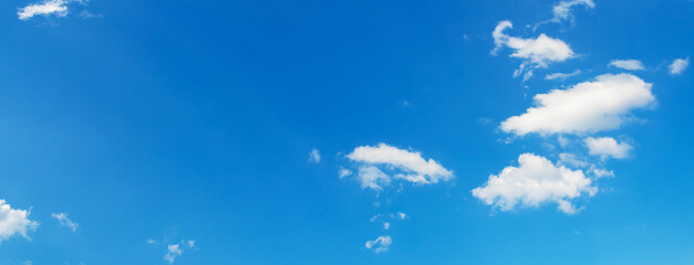 Fototapeta na wymiar Blue sky with small white clouds, copy of space