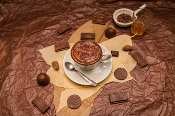 cup of hot chocolate and chocolate bar