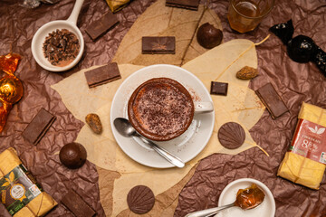 cup of hot chocolate and chocolate bar