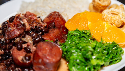 Traditional Brazilian feijoada complete