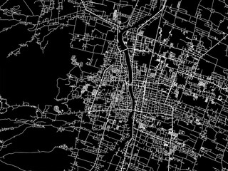 Vector road map of the city of  Kediri in Indonesia with white roads on a black background.