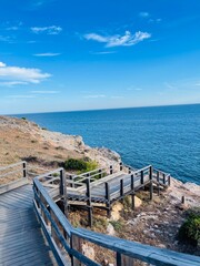 Carvoeiro boardwalk over the Algarve cliffs in Portugal.