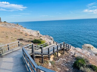 Obraz premium Carvoeiro boardwalk over the Algarve cliffs in Portugal.